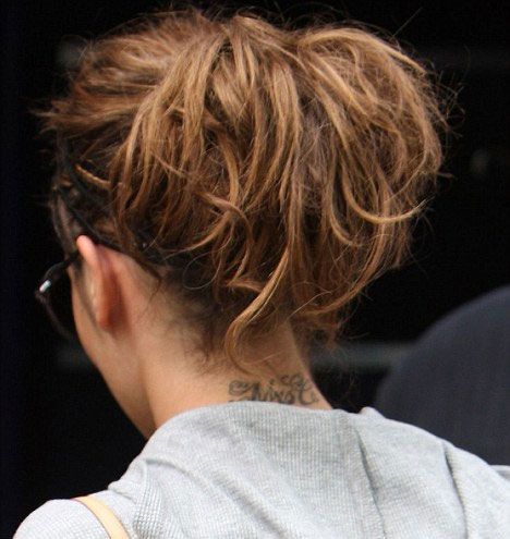 Cheryl Cole to remove tribute tattoo as conflicting divorce reports emerge