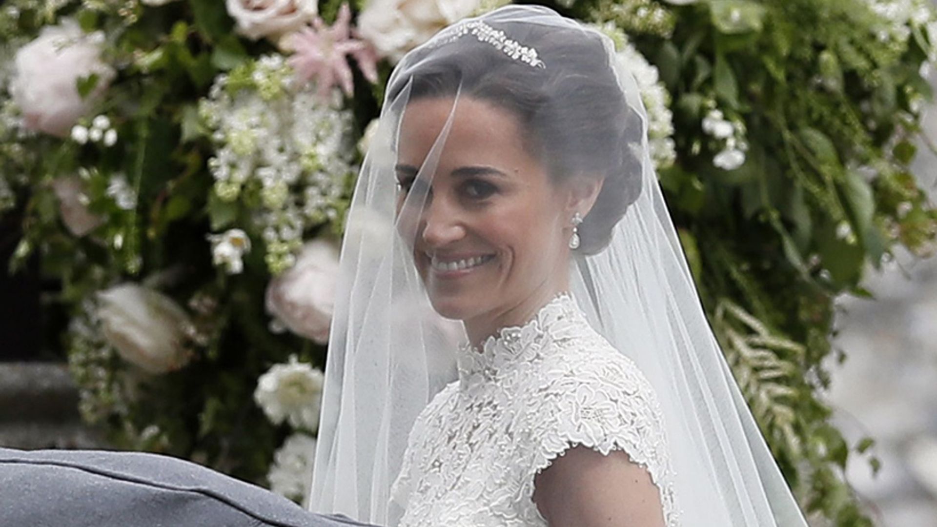 Blushing bride Pippa Middleton arrives for wedding with dad Michael