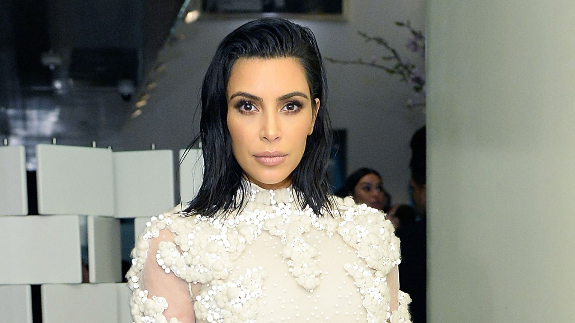 Kim Kardashian makes a foray into bridal wear – and she's already got a celebrity fan