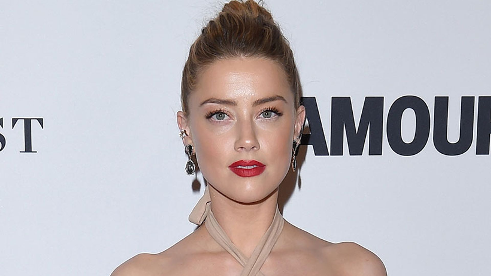 Why Amber Heard hasn't donated her divorce money to charity yet