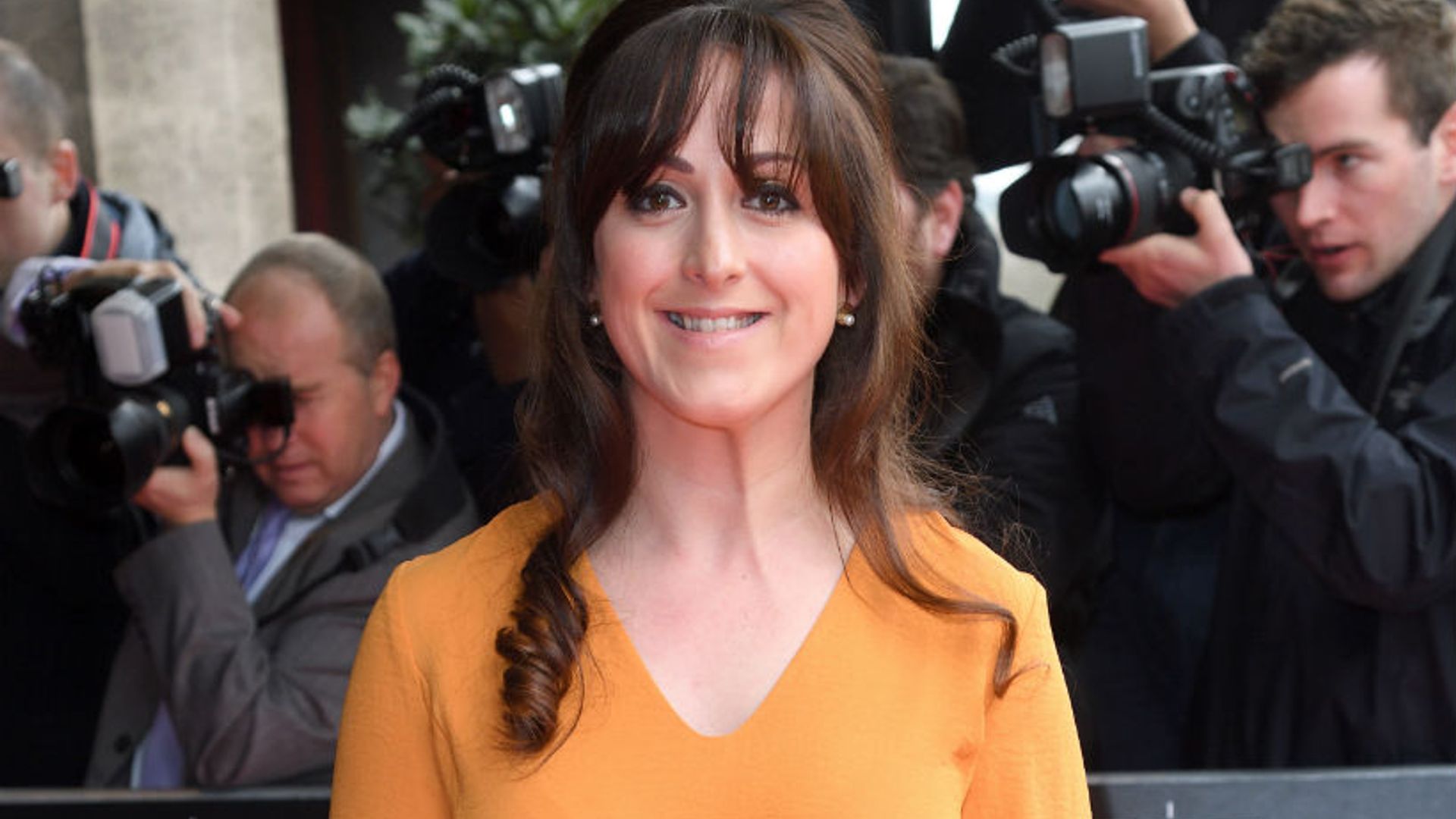 Natalie Cassidy shows off slim figure six months after giving birth