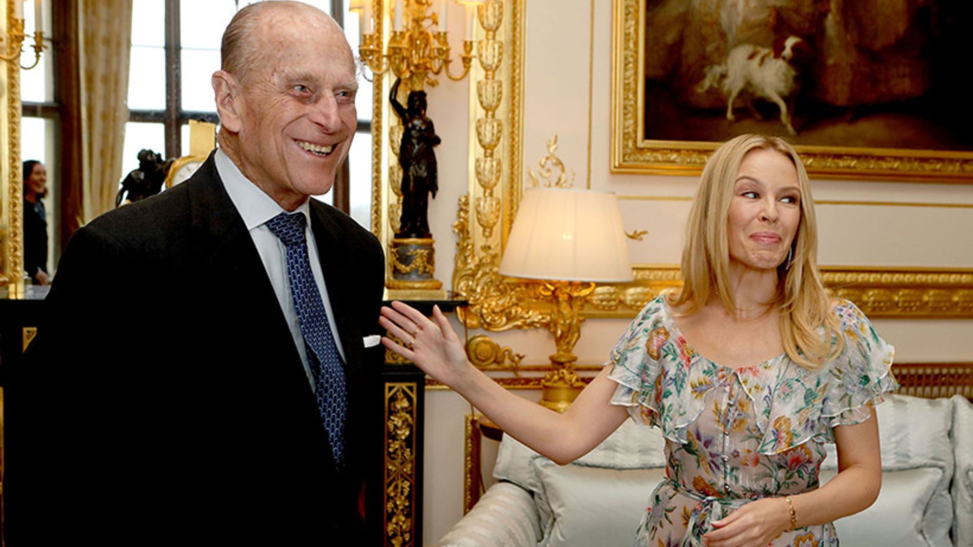 Kylie Minogue shares a giggle with Prince Philip 