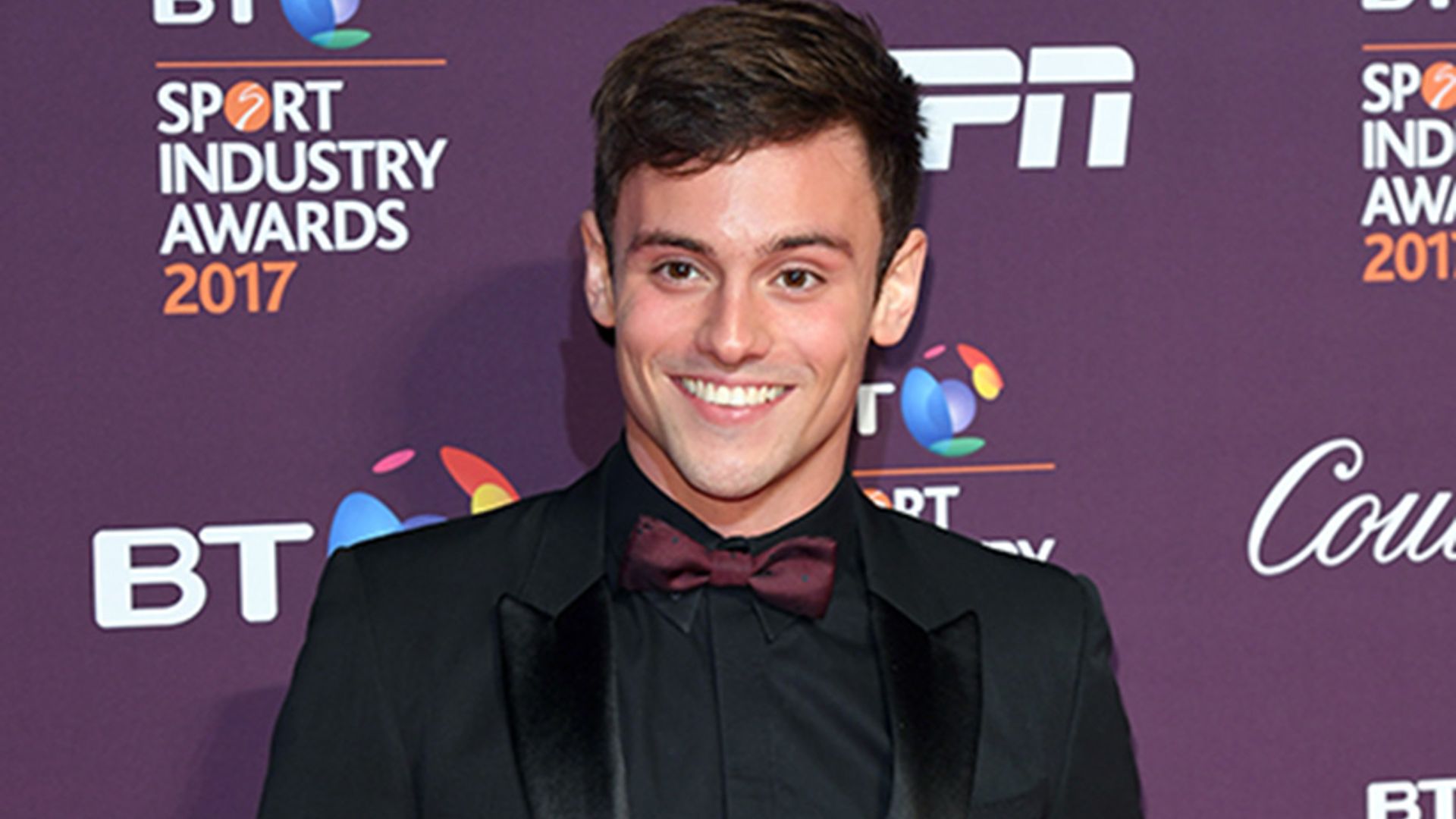 Tom Daley and Dustin Lance Black make first appearance as married couple - see the snap!