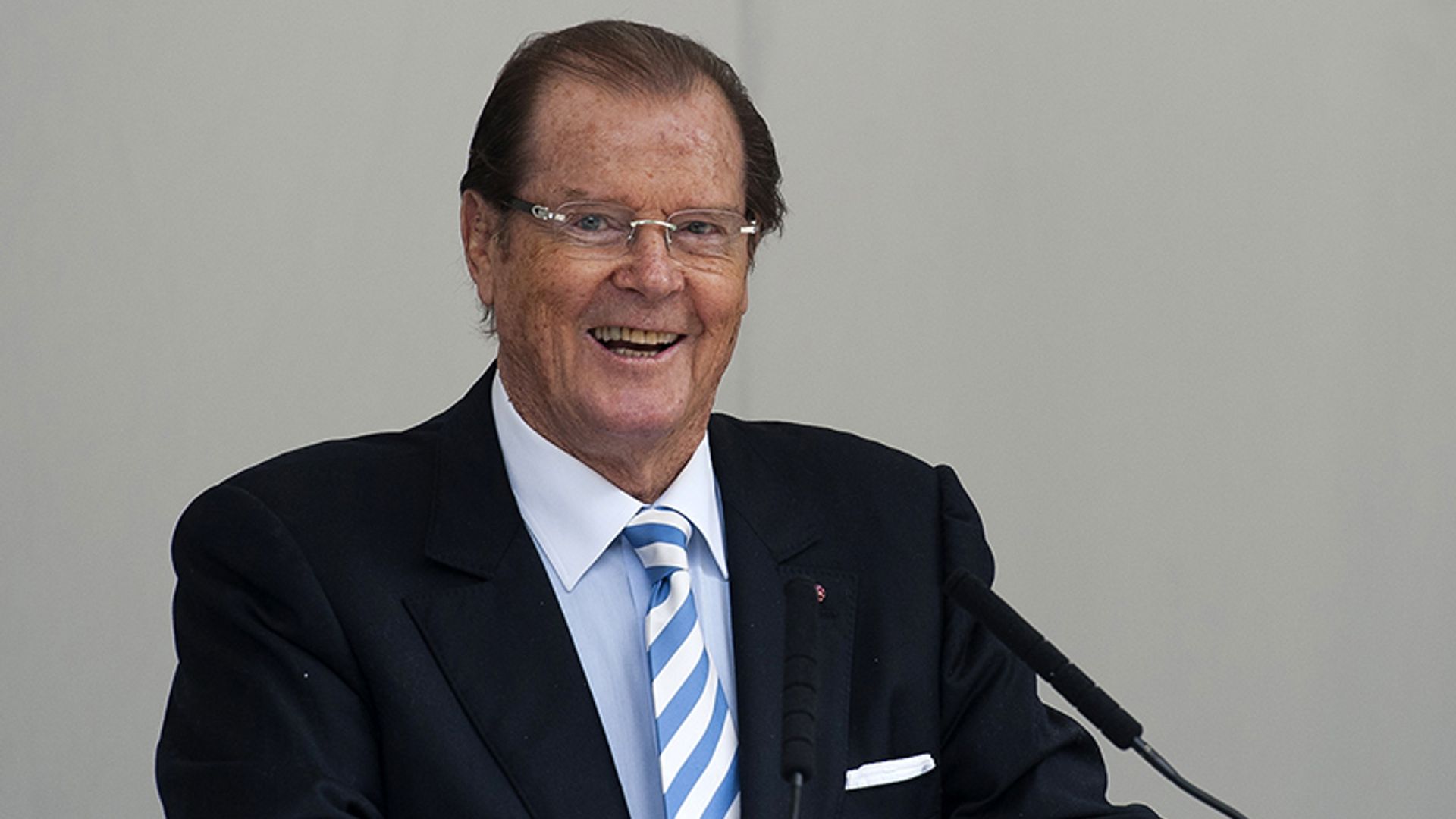 Sir Roger Moore laid to rest in 'beautiful' funeral service