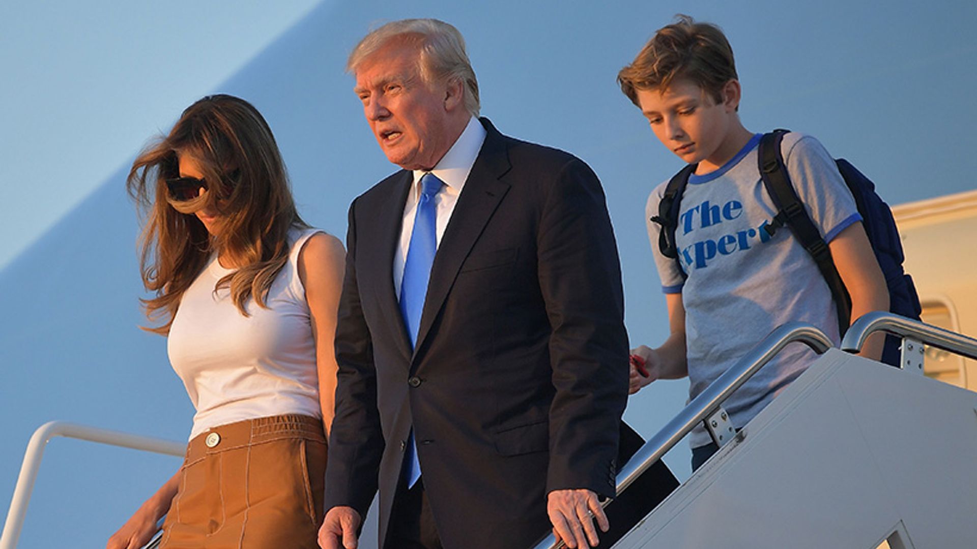 Melania Trump supported by her parents as she moves into the White House with son Barron