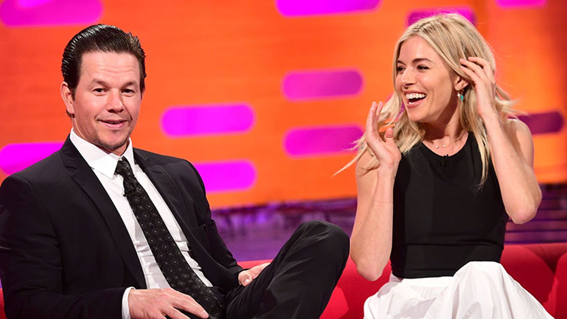 Sienna Miller reveals the embarrassing moment she first met Mark Wahlberg: 'I lactated all over him!'