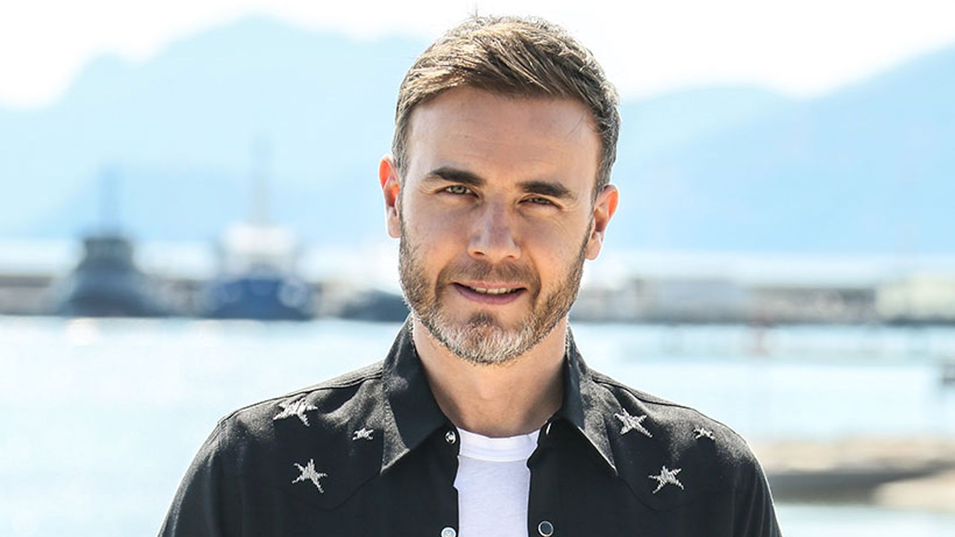 Gary Barlow and lookalike son Daniel pose shirtless in rare photo together