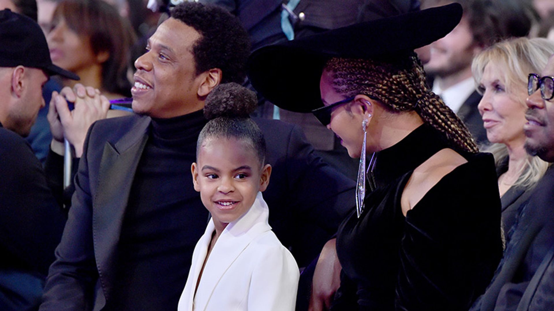 Blue Ivy with parents at Grammys