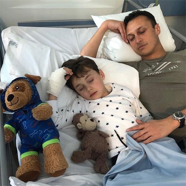 chris bisson with son in hospital