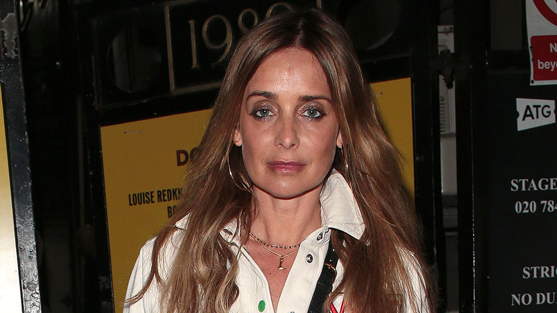 Louise Redknapp ordered to appear in court after 'running a red light'