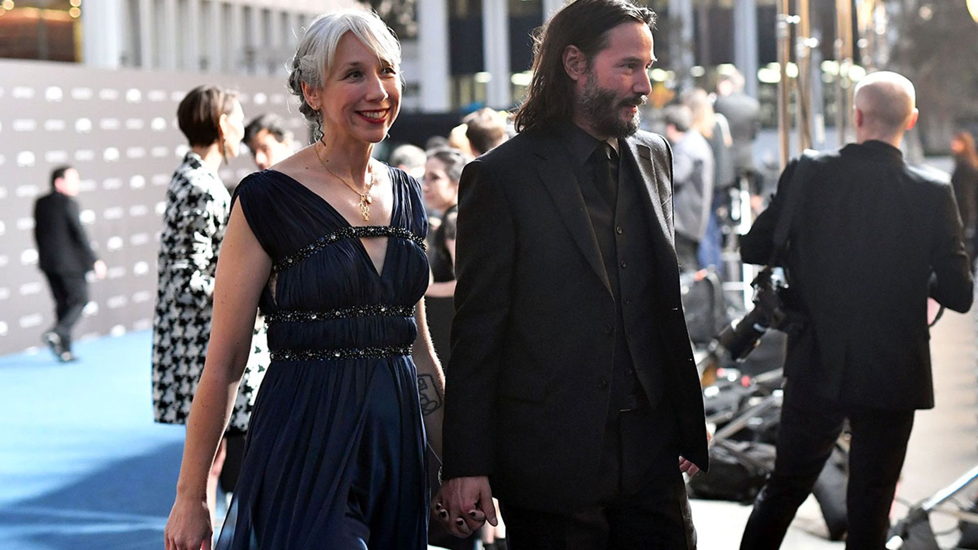 Keanu Reeves sparks romance rumours as he holds hands with Alexandra Grant on the red carpet