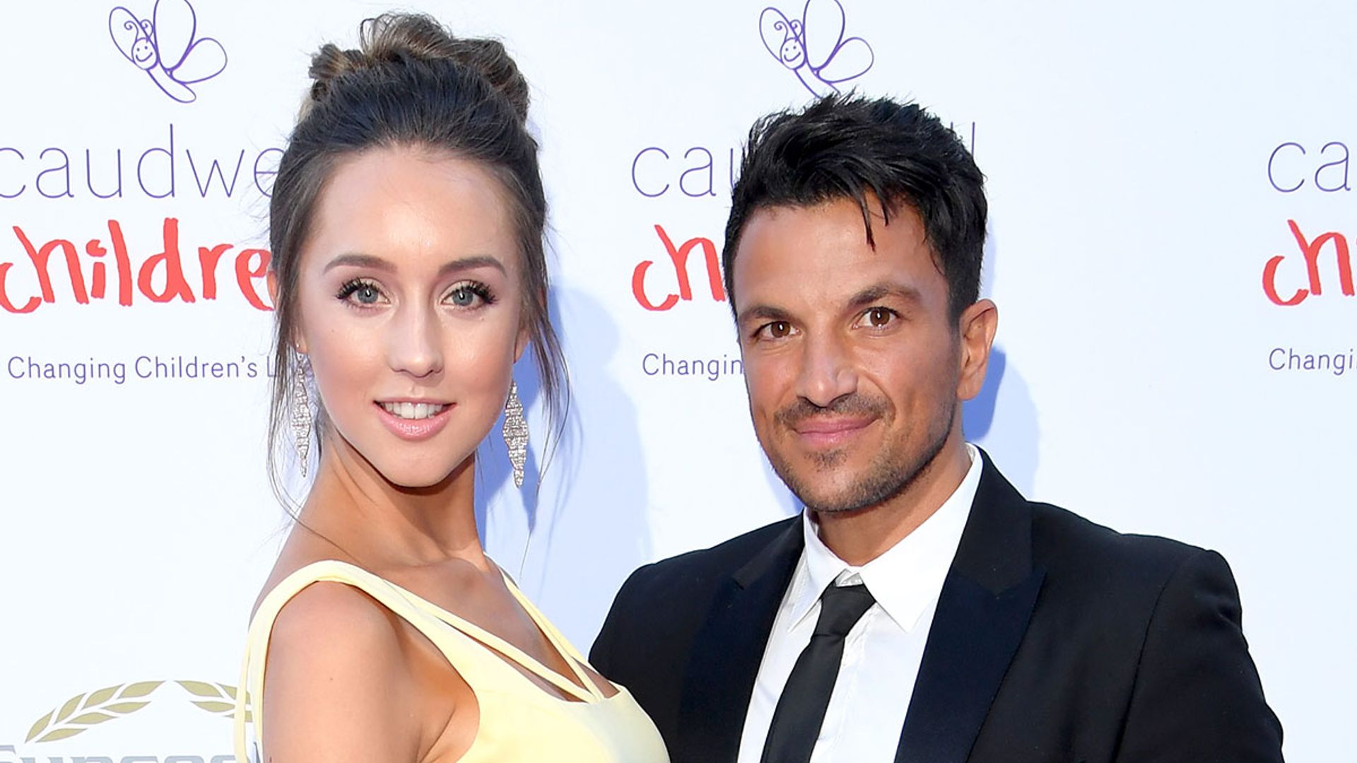 Peter Andre poses with radiant wife Emily after tough session in home gym