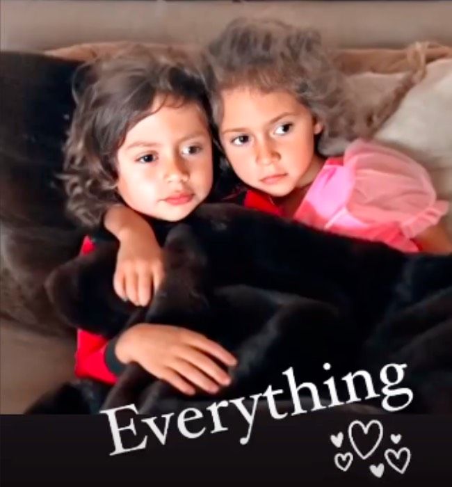 Jennifer Lopez twins emme and max cuddle on the sofa