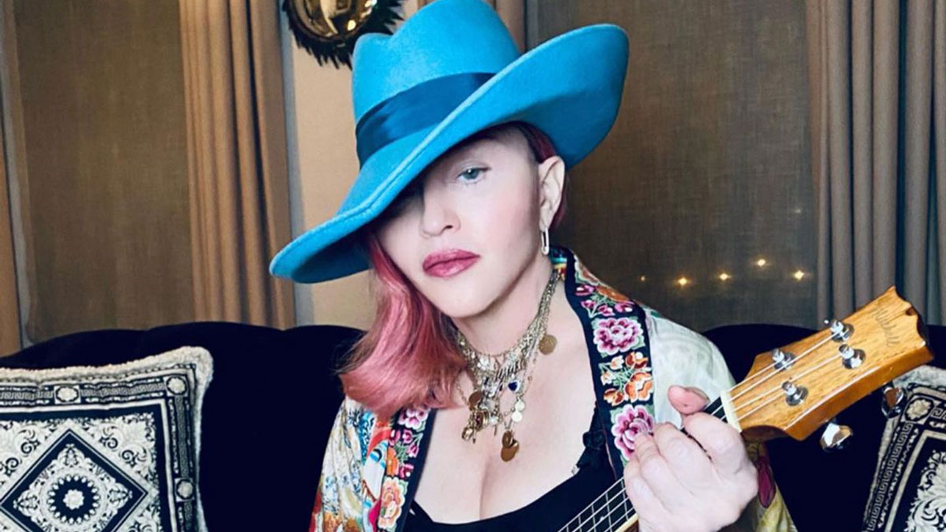 Madonna and her six children pose for rare family picture – fans react