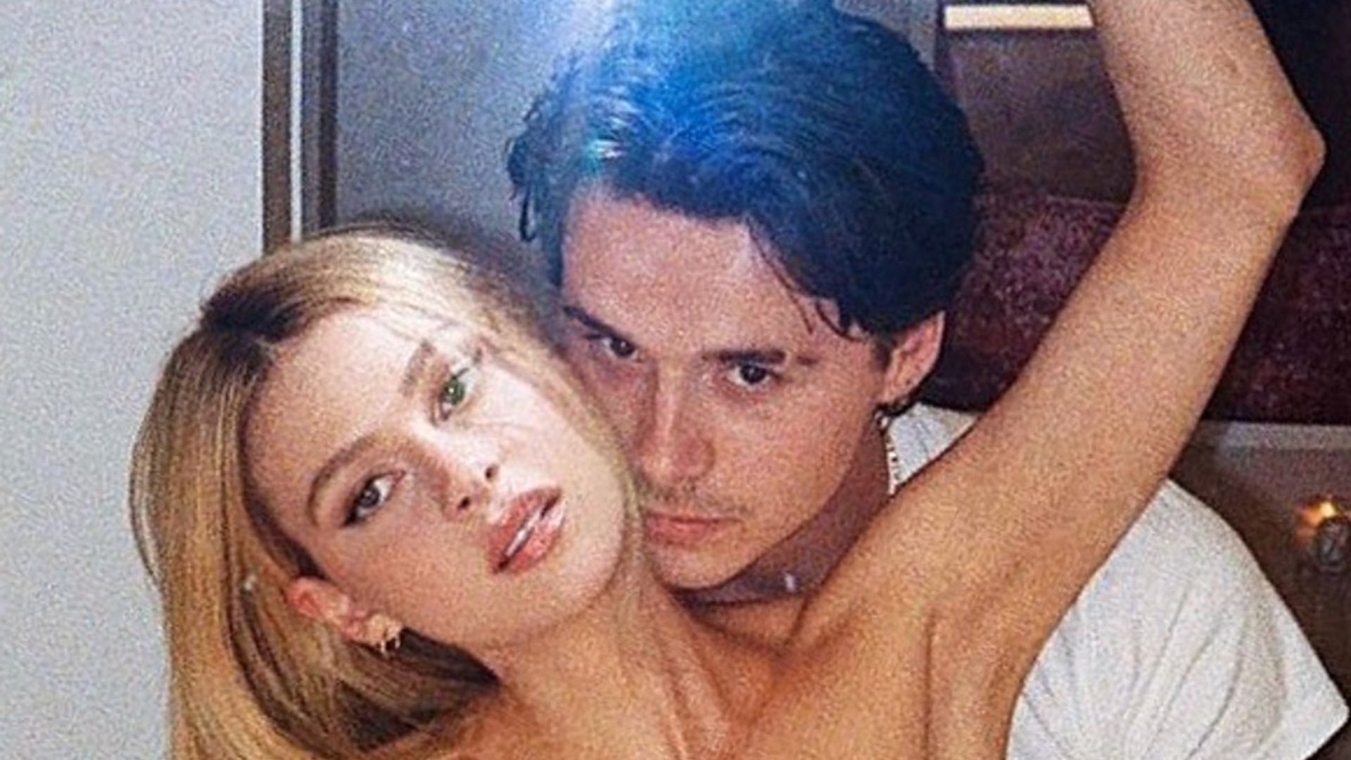 Brooklyn Beckham poses topless with fiancée for intimate photo - fans react