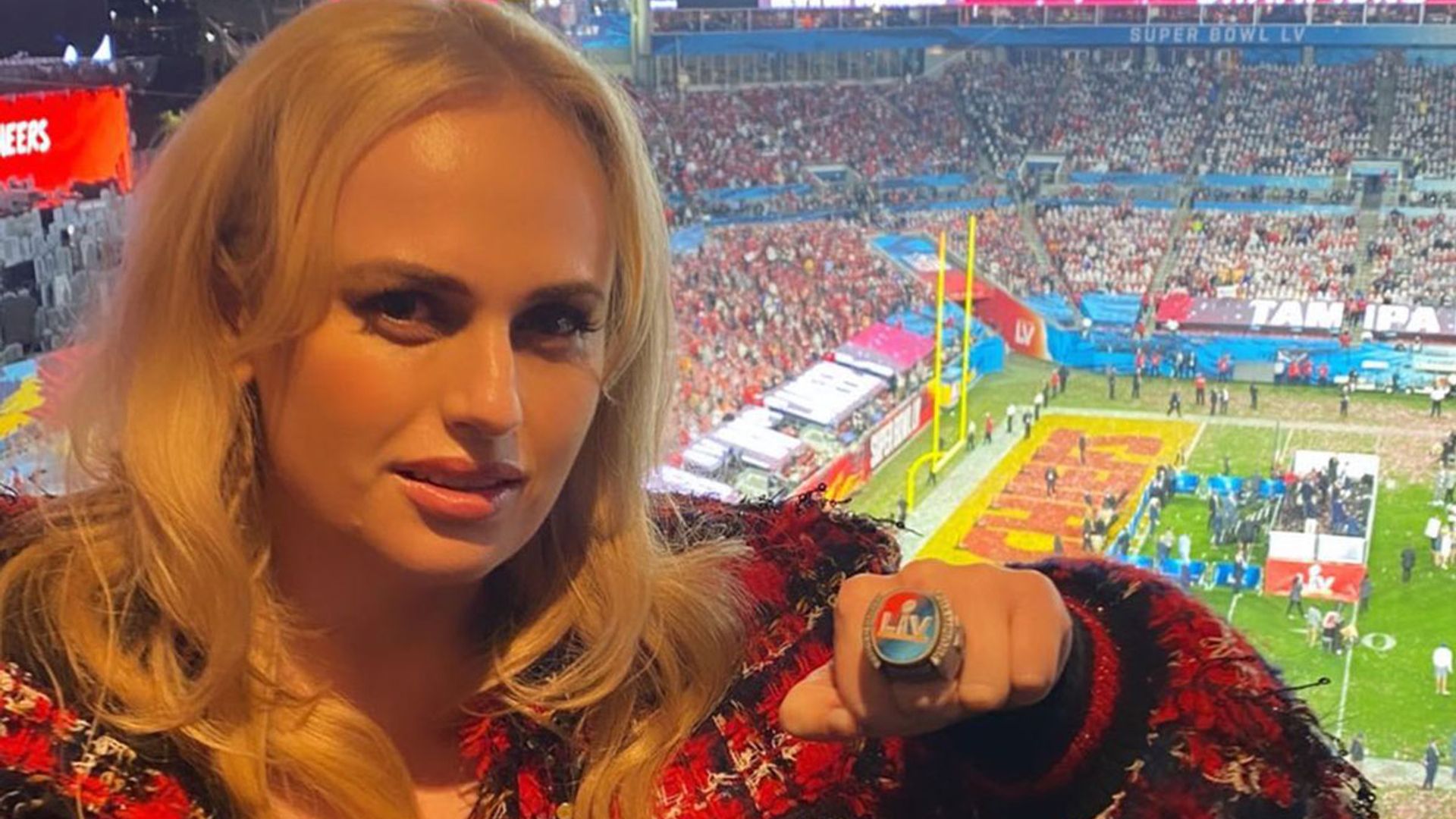 Rebel Wilson poses with 'husband' at Super Bowl days after Jacob Busch split