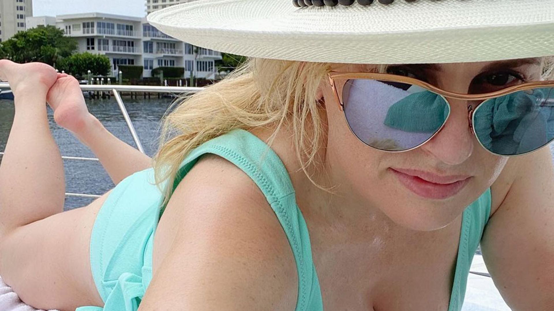 Rebel Wilson shares daring beach selfie in stunning low-cut swimsuit