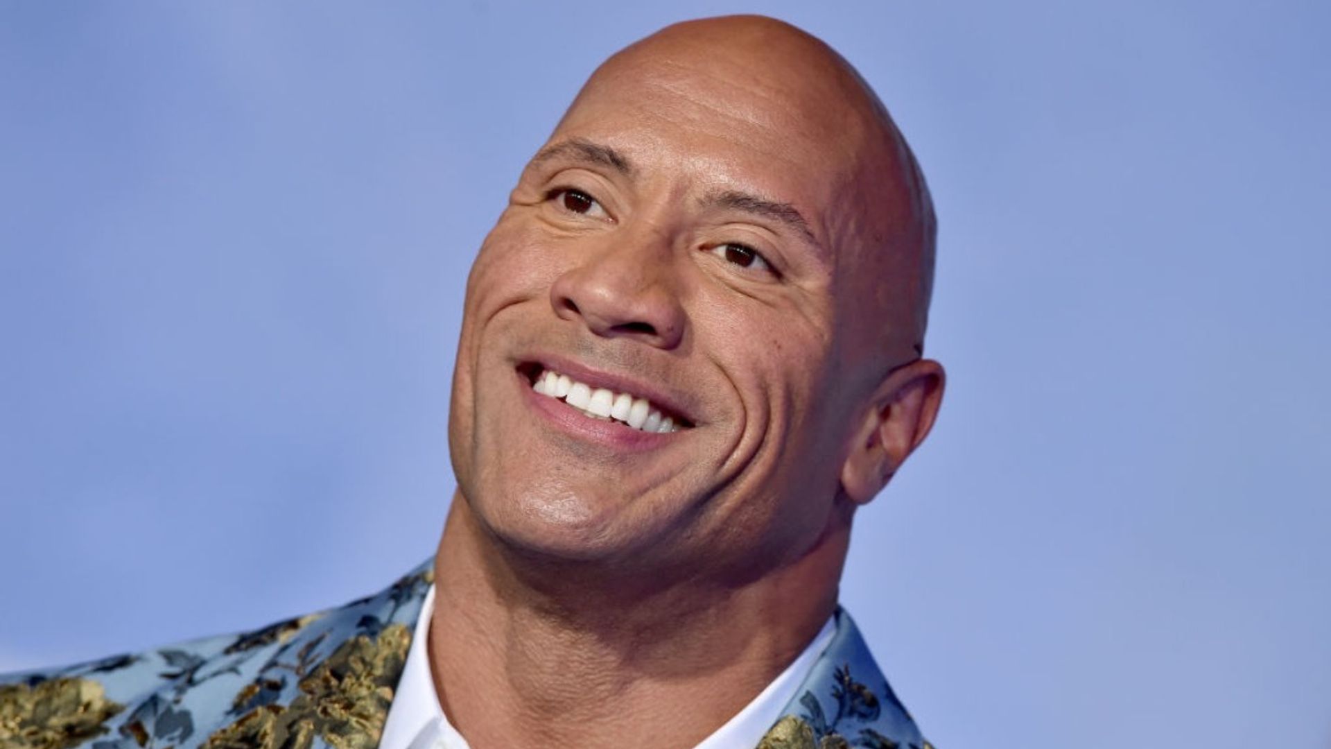 The Rock can't believe how much this police officer looks like him – and you won't, either
