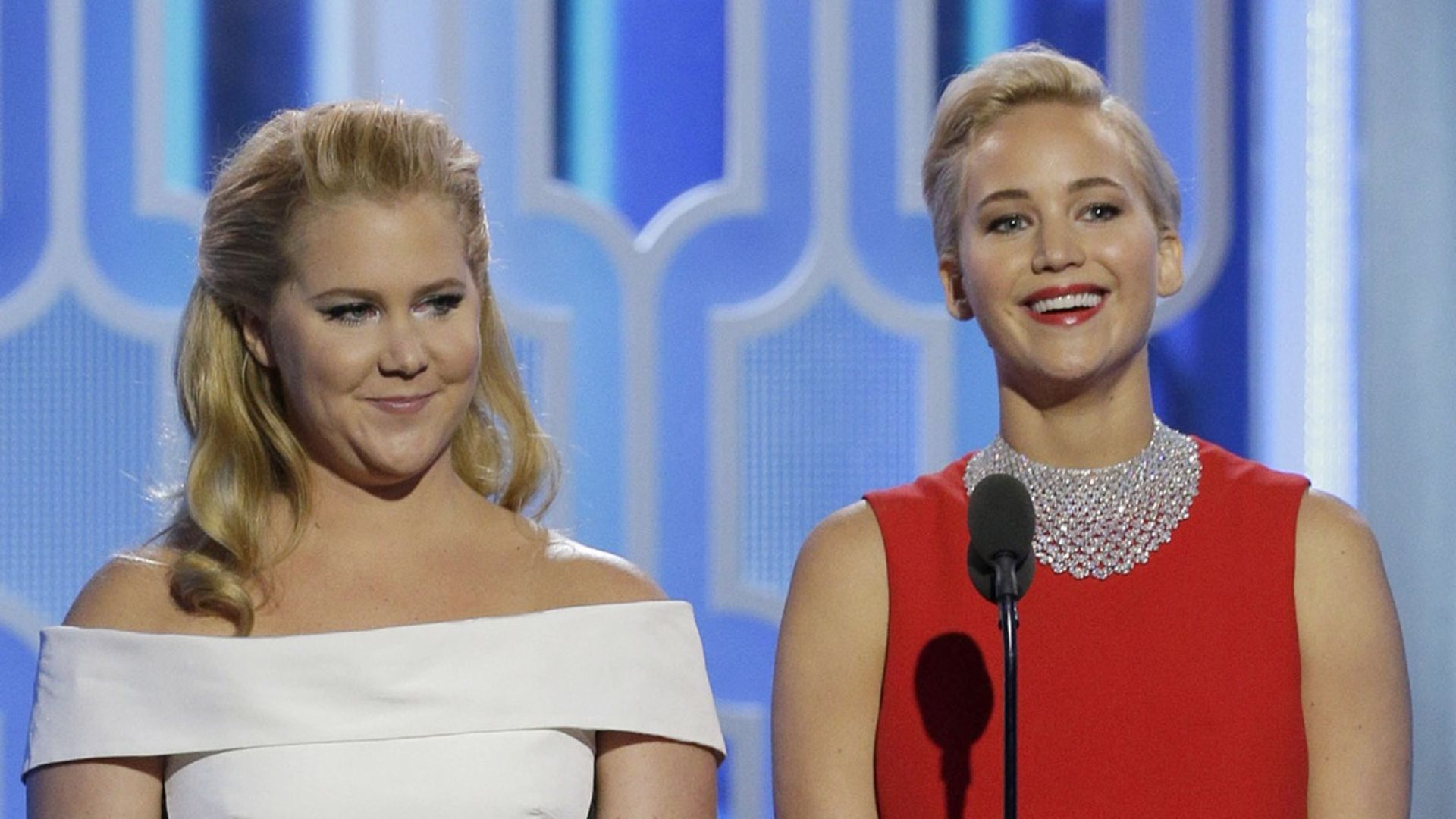 Pregnant Jennifer Lawrence rocks gingham dress for special reunion with Amy Schumer