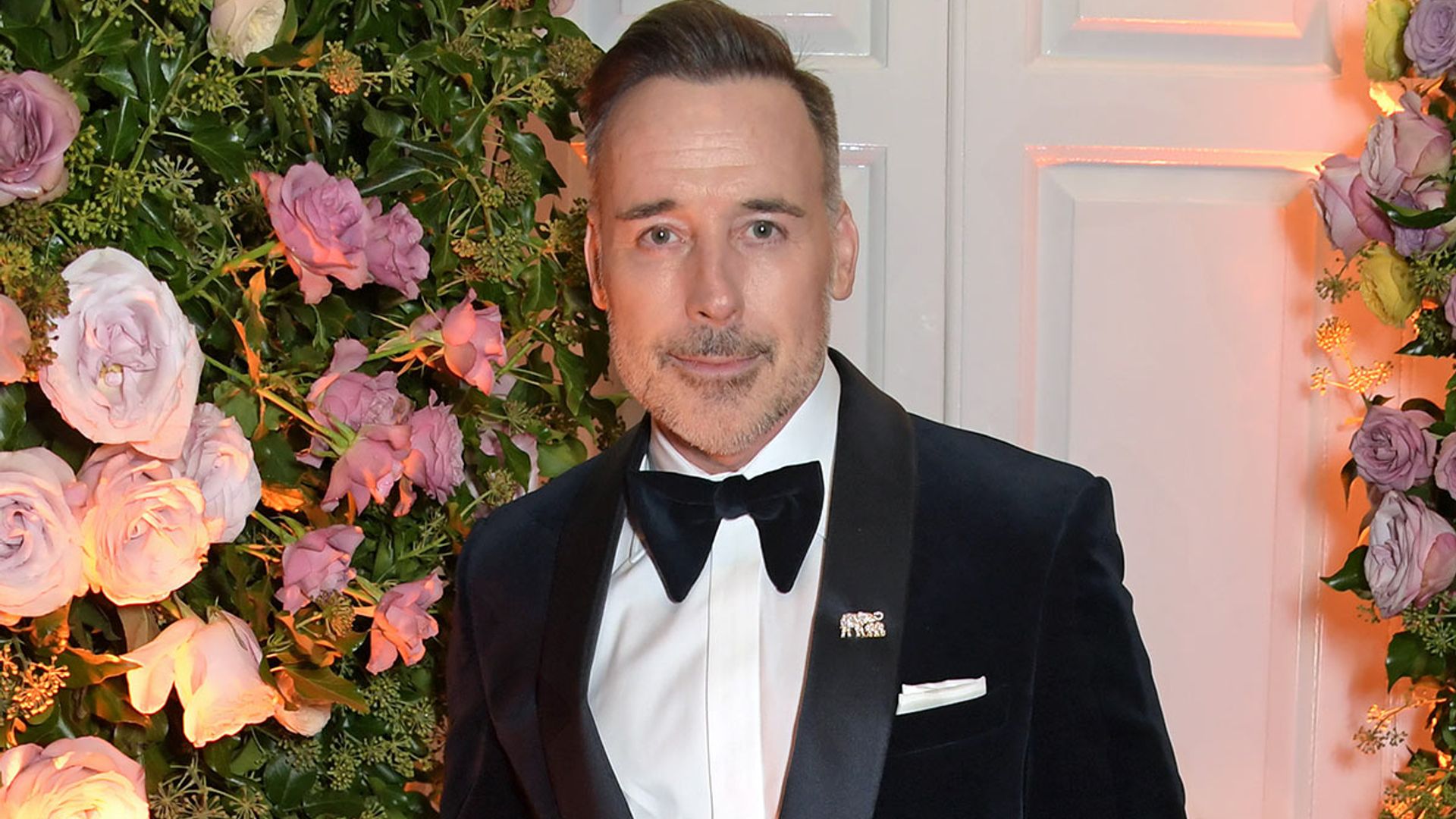 David Furnish poses with sons Elijah and Zachary in epic Halloween costumes