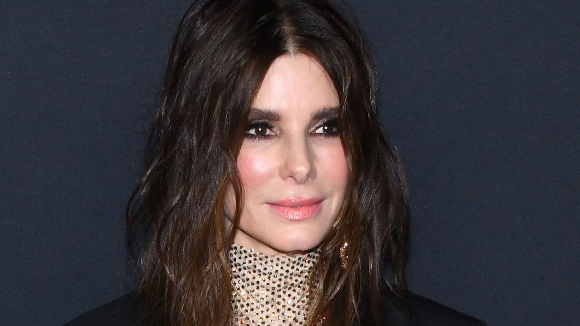Sandra Bullock lets her son 'see everything' as she teaches children about racism