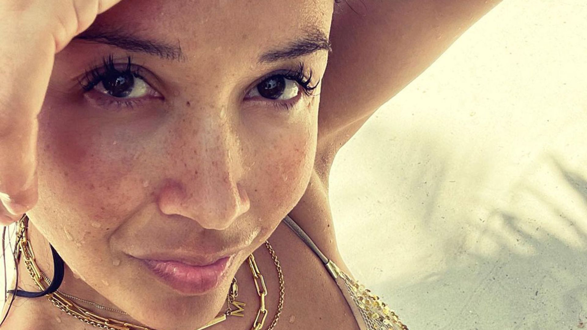 Myleene Klass is a goddess as she poses for beach selfie in gold bikini