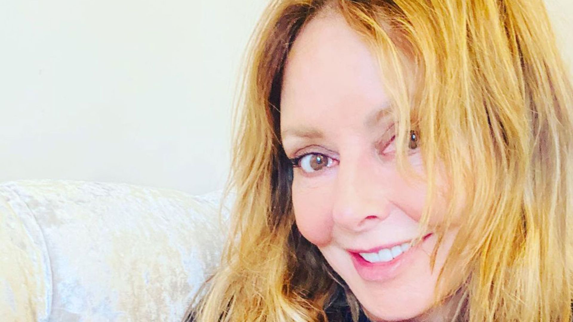 Carol Vorderman poses in figure-hugging activewear and she pleads with fans for help