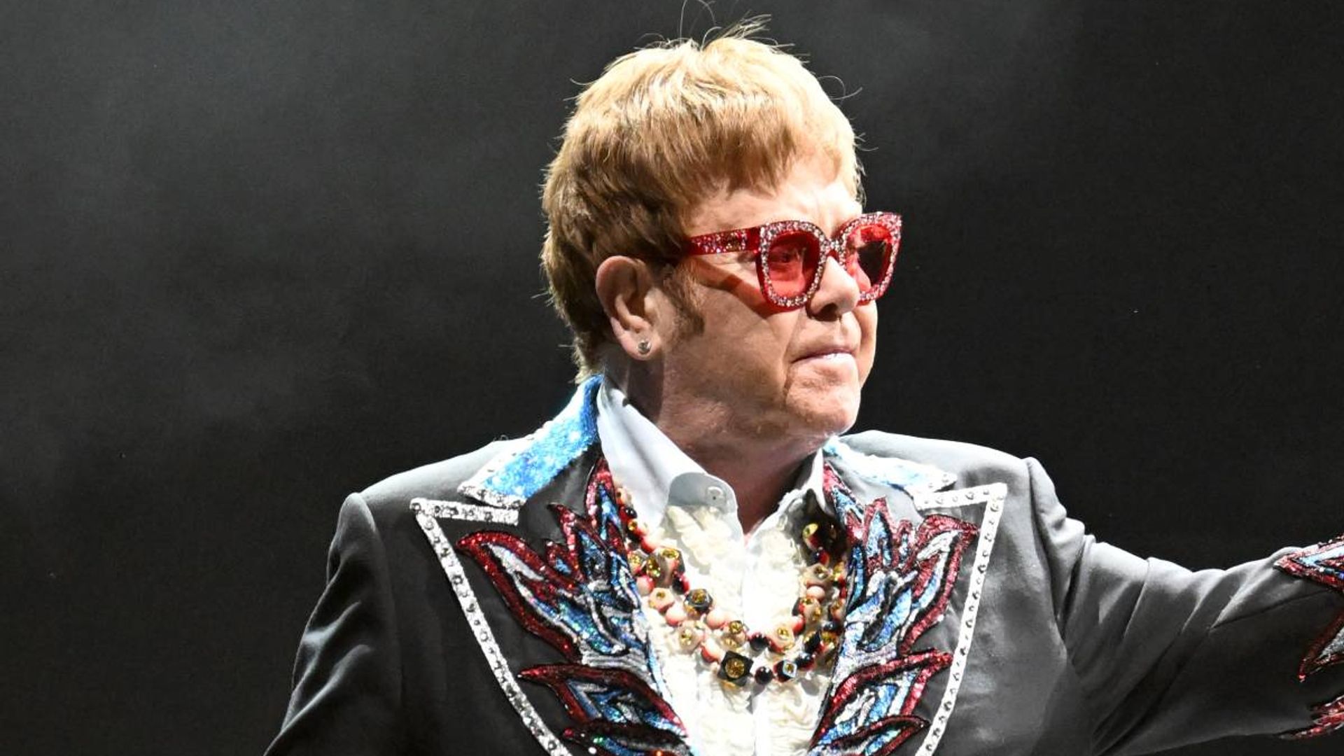 Elton John shares emotional tribute as he makes surprise appearance