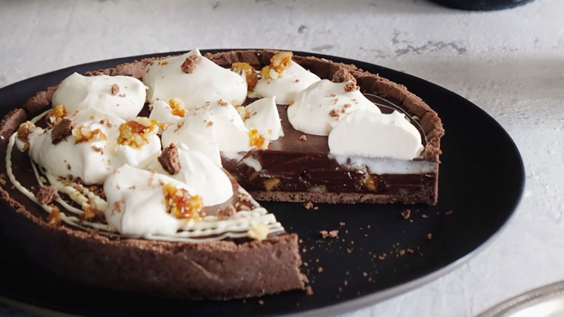 GBBO's John Whaite shares a Baileys chocolate tart recipe - the perfect alcohol inspired showstopper
