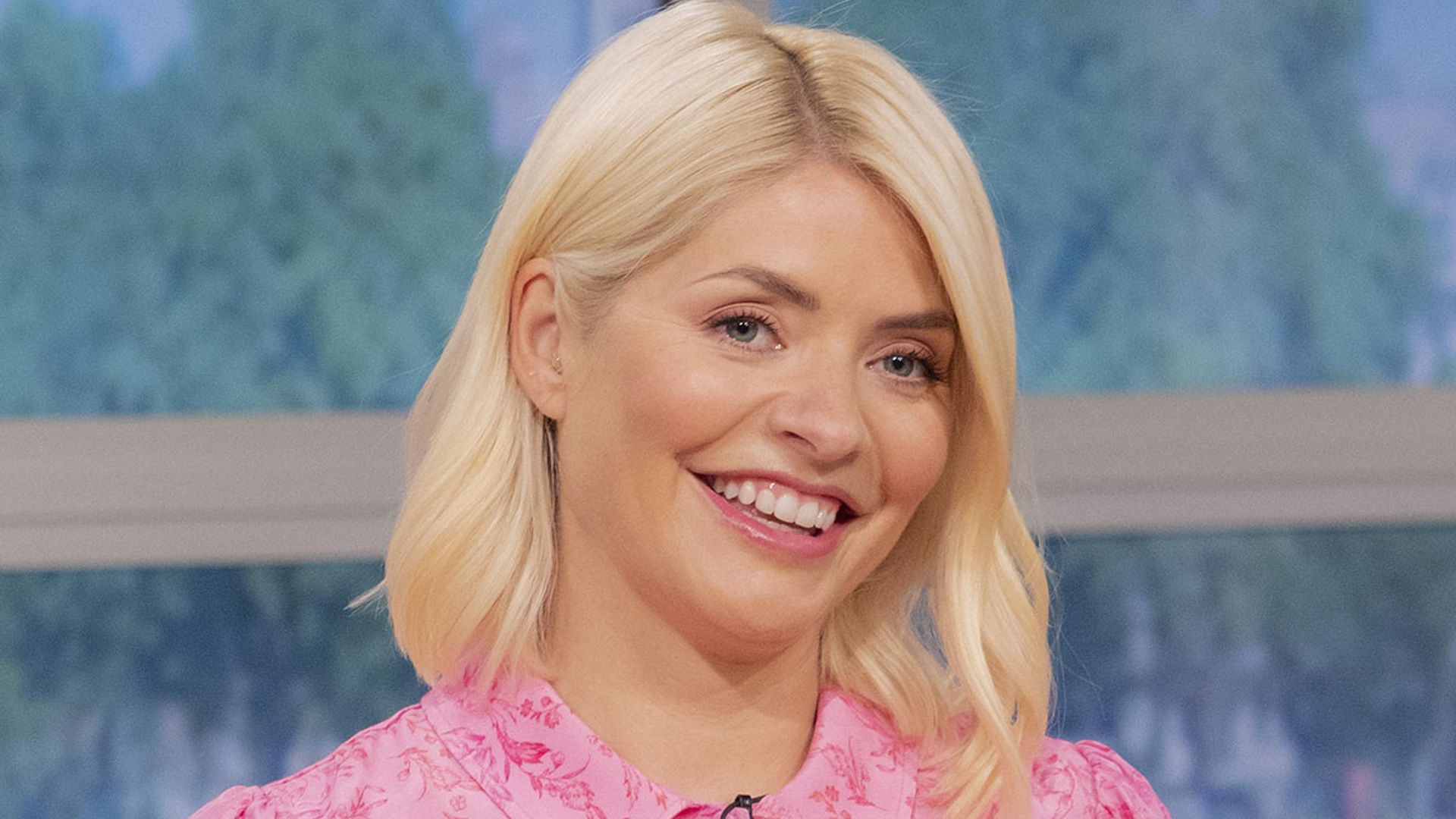 Holly Willoughby is picture perfect in flirty floral mini dress