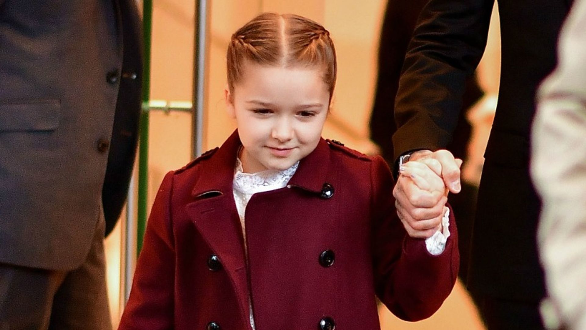 Harper Beckham is a mini style icon in Gucci swimsuit