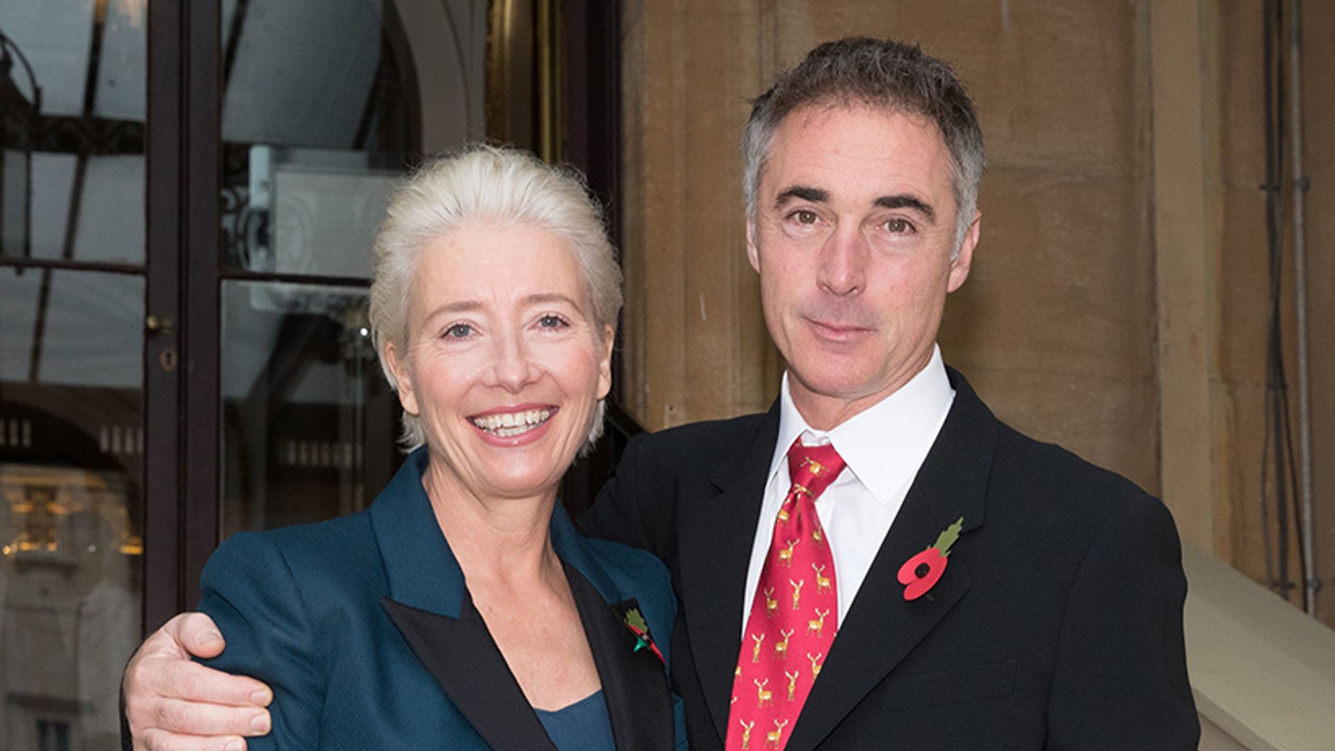 Emma Thompson is chic in teal trouser suit at Buckingham Palace