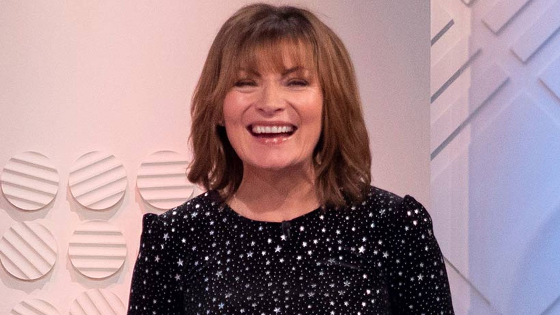 Lorraine Kelly has a Jessica Rabbit moment in the most stunning sequin red dress