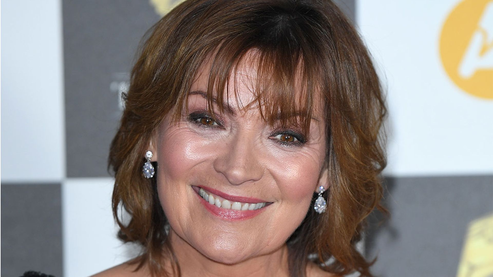 Lorraine Kelly's green and yellow wrap dress is from ASOS & fans are obsessed