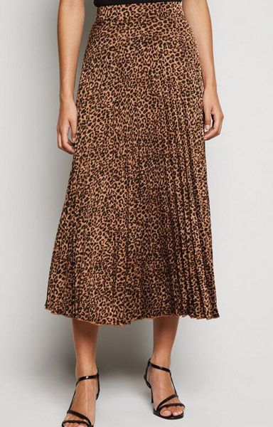 Kate Middleton in a leopard print skirt 