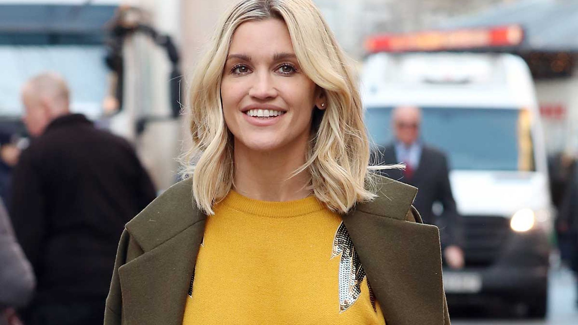 Ashley Roberts wears the perfect green slip dress and River Island boots