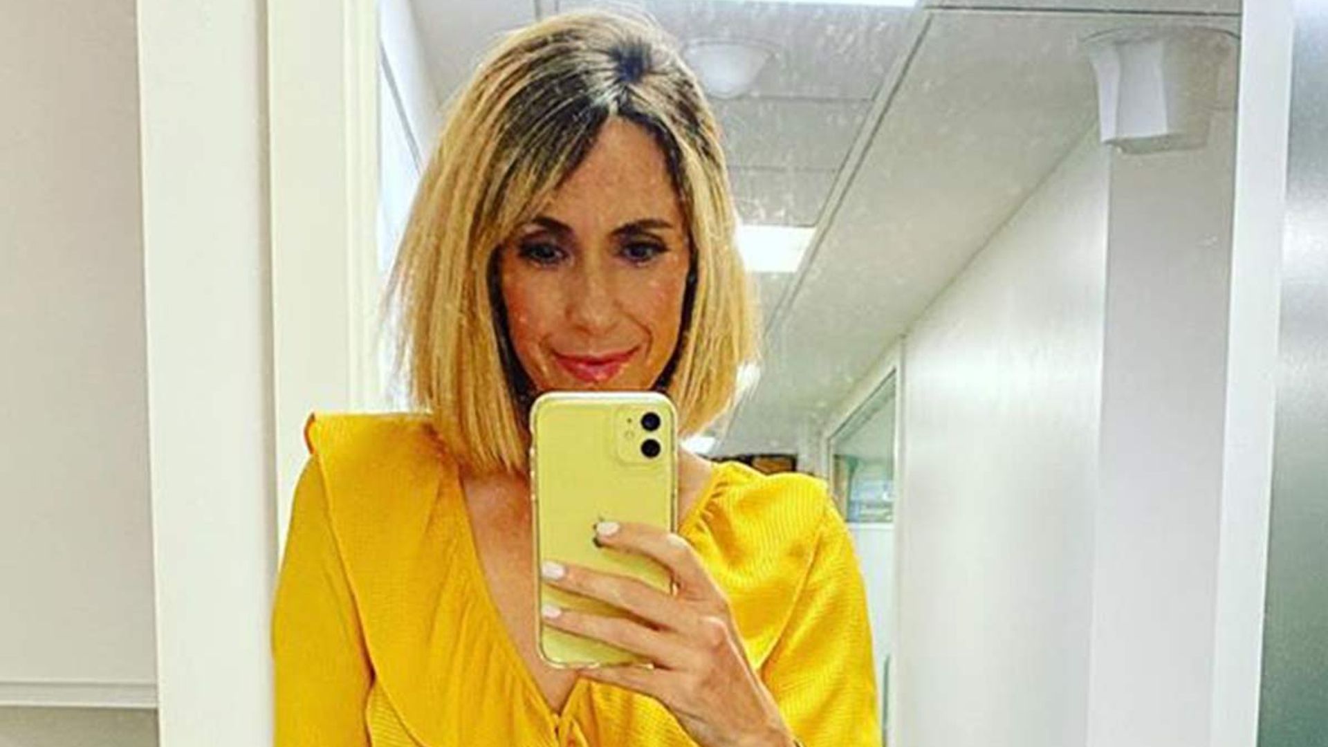 Alex Jones' gorgeous yellow blouse might be the brightest top we've ever seen