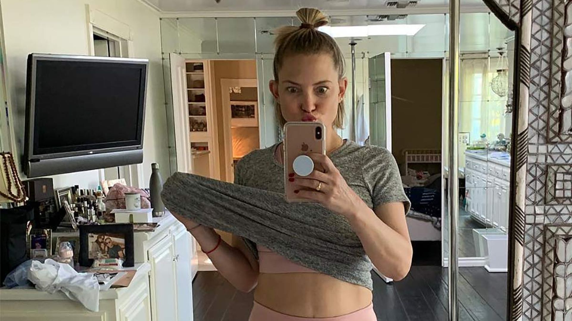 Kate Hudson shares glimpse of designer slippers as she shows off her abs in new gym clothes