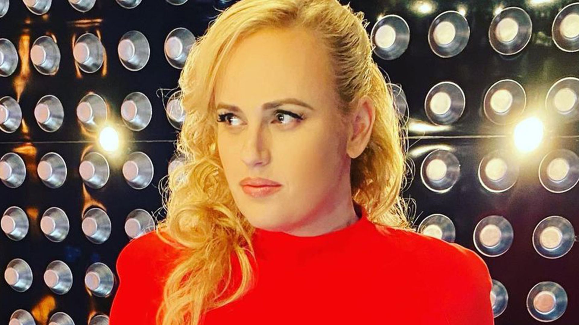 Rebel Wilson fans go wild for her latest figure-hugging gown - and Meghan Markle's worn it too!