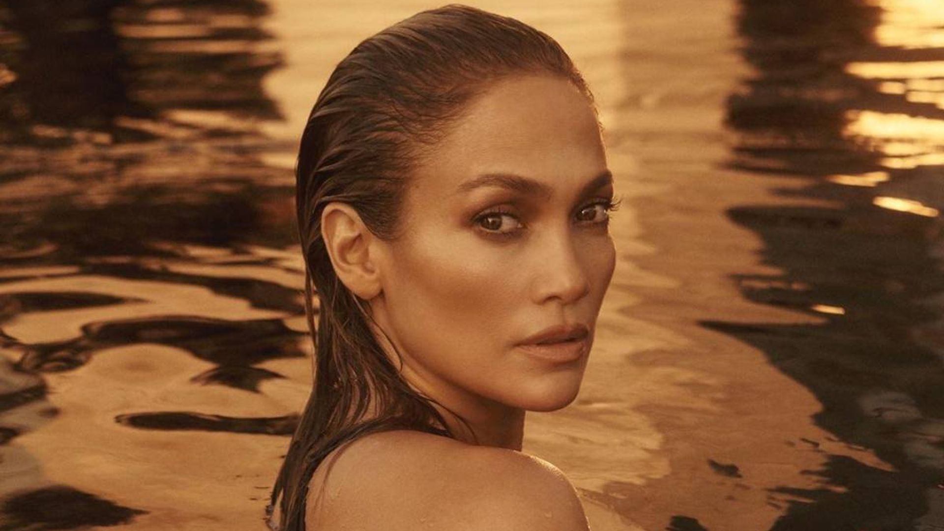 Jennifer Lopez nearly broke the internet in the glammest metallic swimsuit 