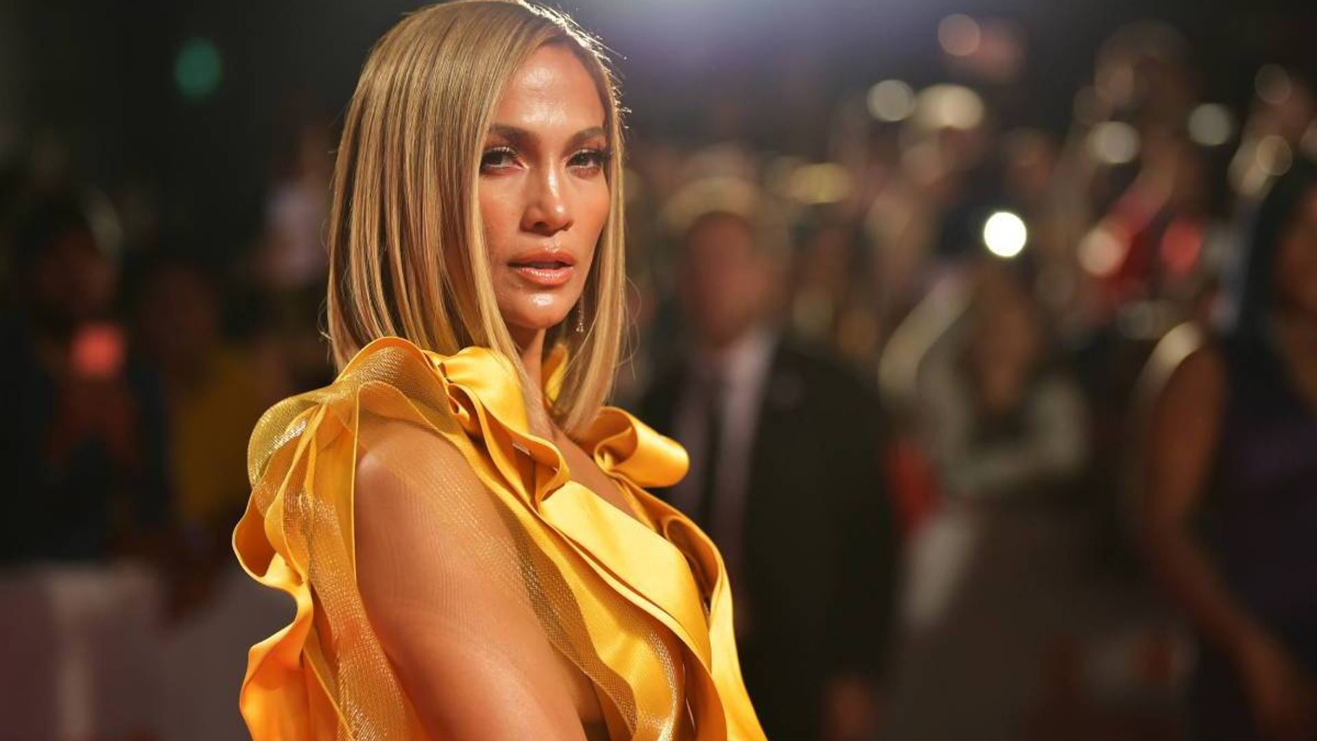 Jennifer Lopez sizzles in a neon cutout dress that will blow your mind