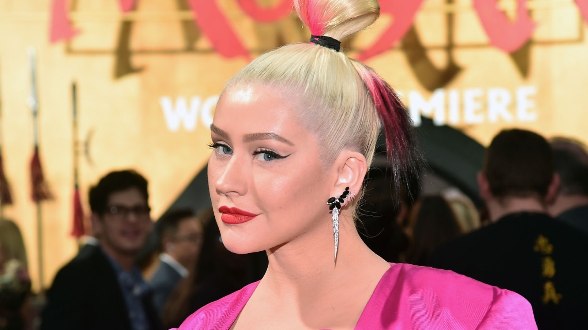 Christina Aguilera absolutely stuns in dynamite velvet suit