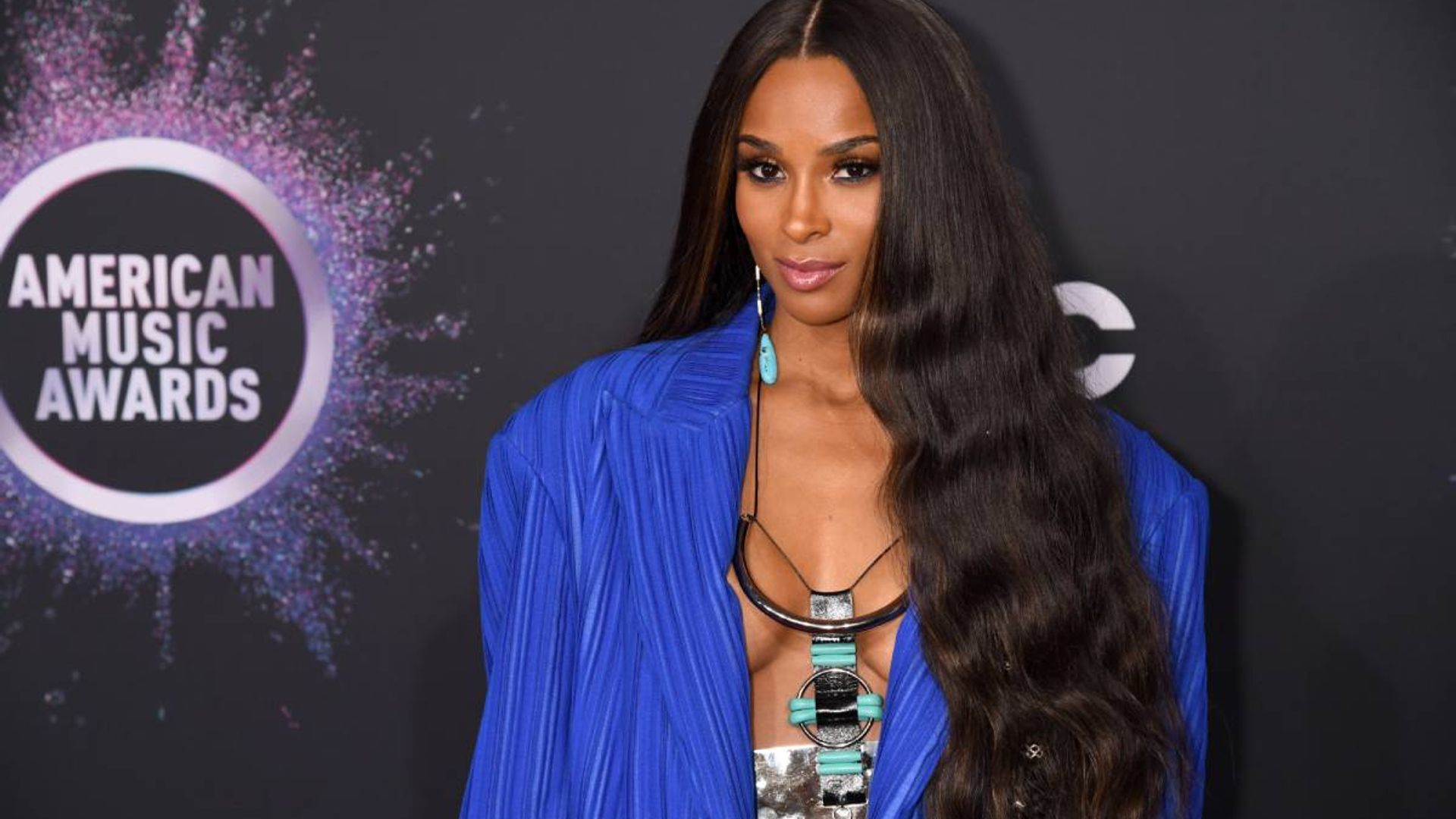 Ciara turns heads in a stunning wrap mini dress as she makes an exciting announcement