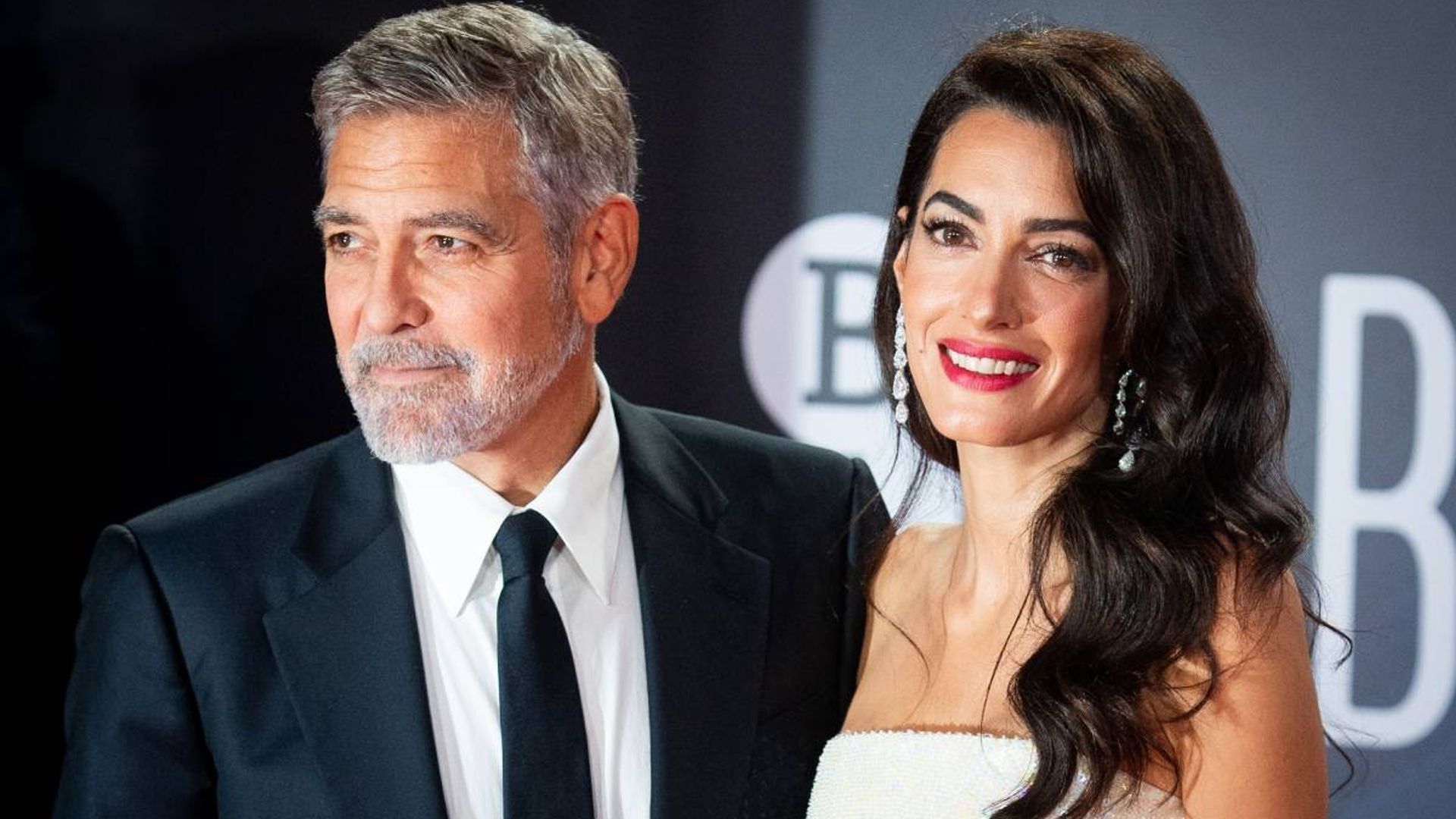 Amal Clooney wows in a chic mini dress on date night with George Clooney