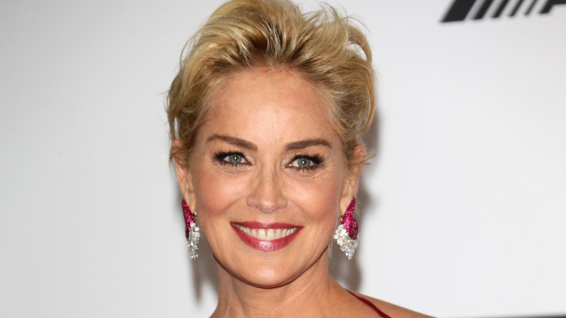 Sharon Stone stuns in a sensational red patterned dress