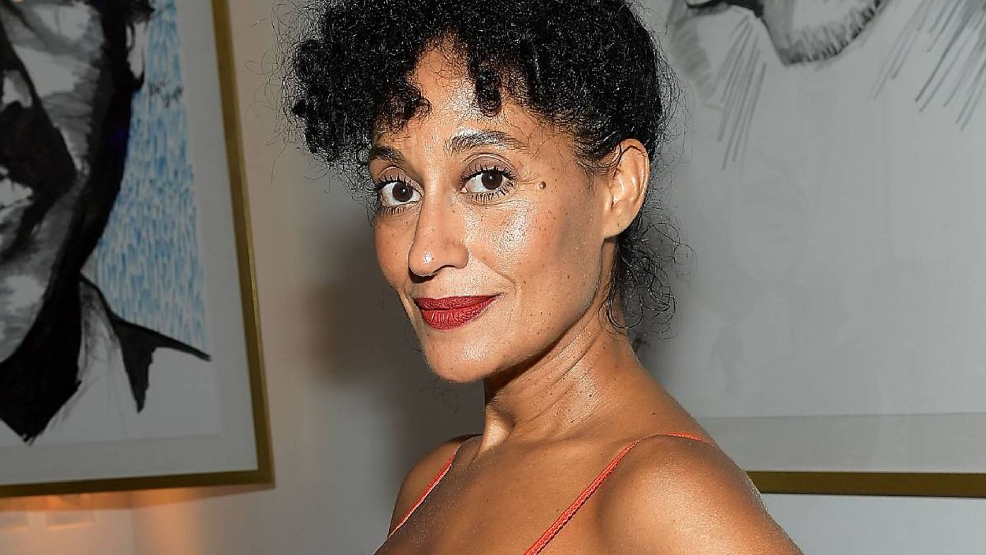 Tracee Ellis Ross looks fantastic in sequin mini dress and stilettos as she takes a trip down memory lane