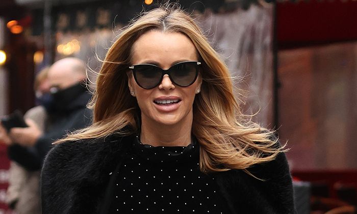Amanda Holden poses up a storm in gorgeous mini-dress