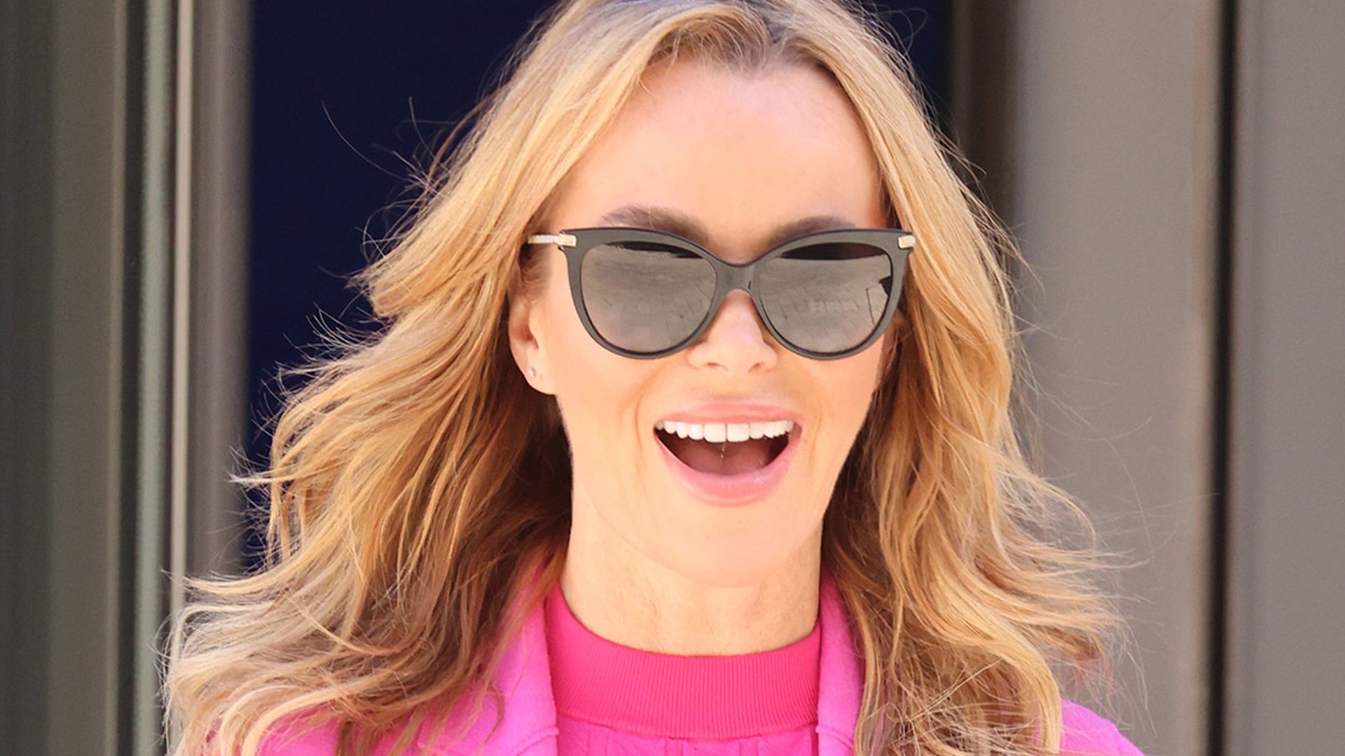 Amanda Holden is picture-perfect in dazzling pink jumpsuit