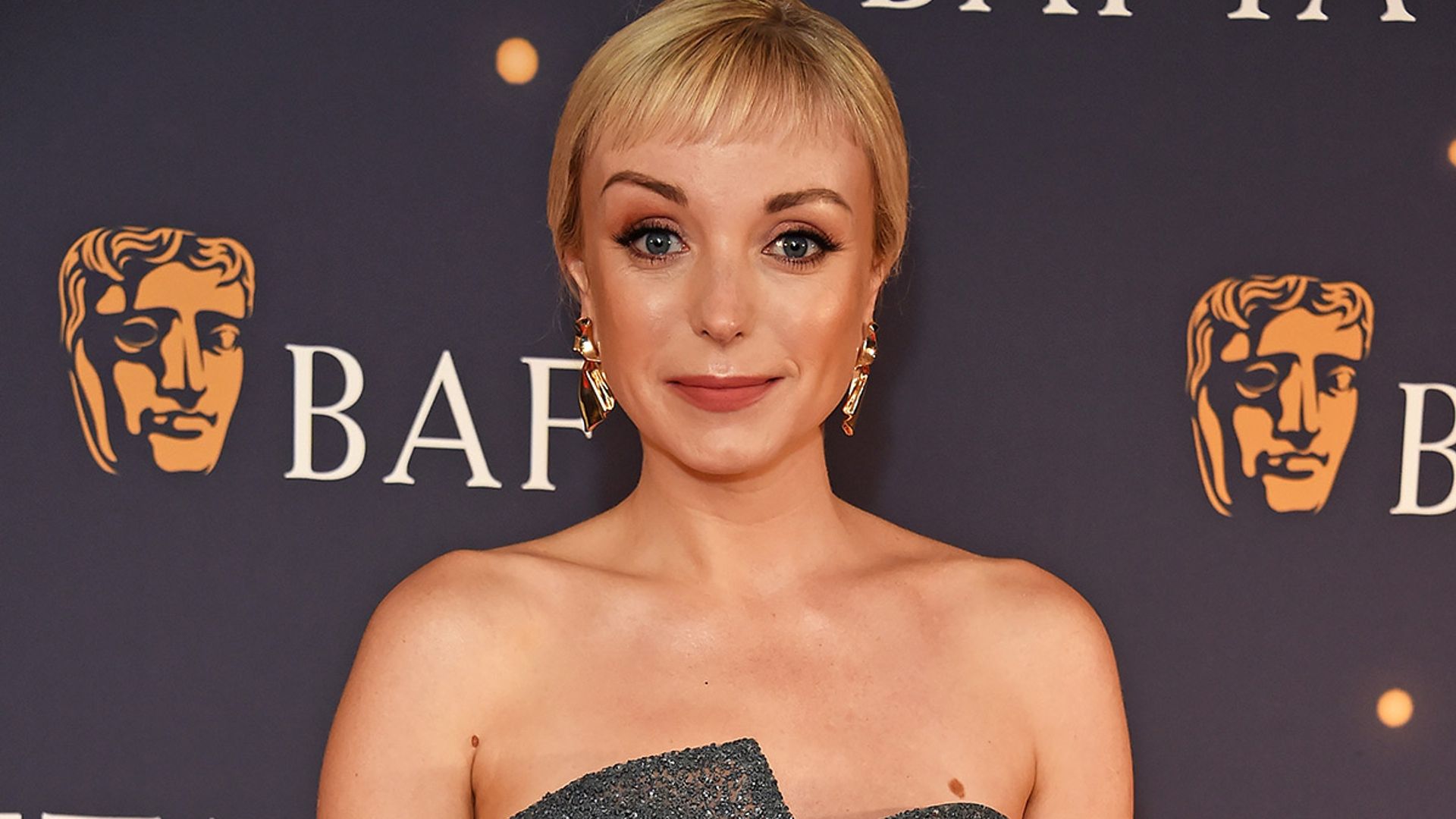 Helen George looks beautiful in sparkling backless dress