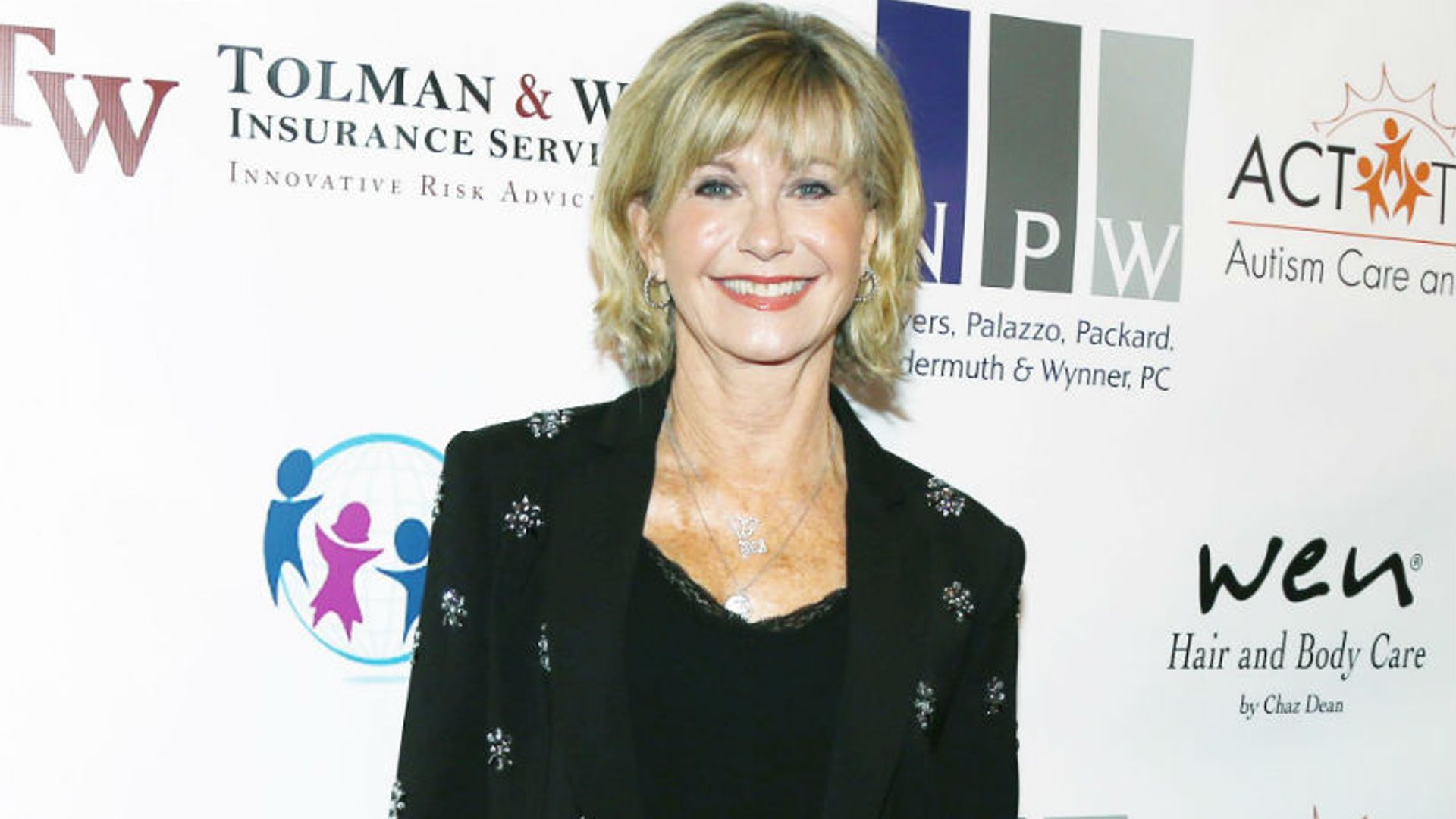 Olivia Newton-John steps out in chic outfit following cancer diagnosis